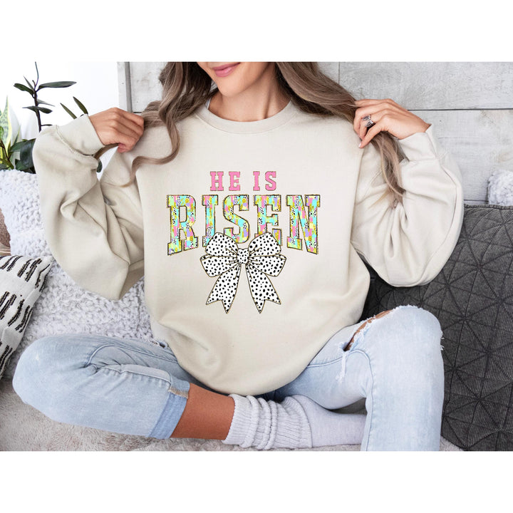 Bright and joyful He Is Risen print with a trendy polka dot bow, ideal for Easter and church gatherings.