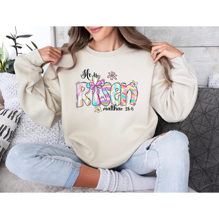 Religious Easter heat transfer featuring a cross, scripture, and pink bow for faith-based DIY fashion and family shirts