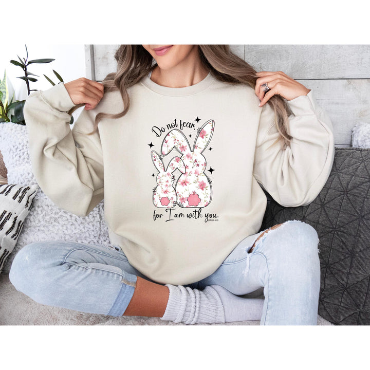 Vintage-inspired bunny print featuring intricate floral details and scripture, perfect for religious fashion.