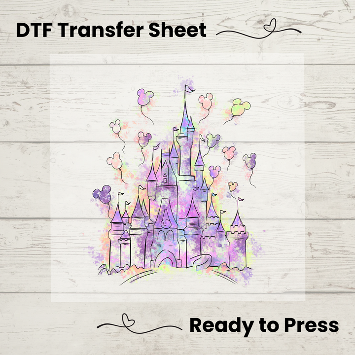 Vibrant watercolor castle DTF transfer sheet featuring pastel tones and balloon accents, ready to press on t-shirts and hoodies.
