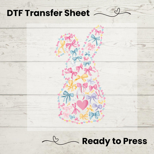 A cute bunny silhouette created with pastel bows, hearts, and floral accents for a soft, springtime look.