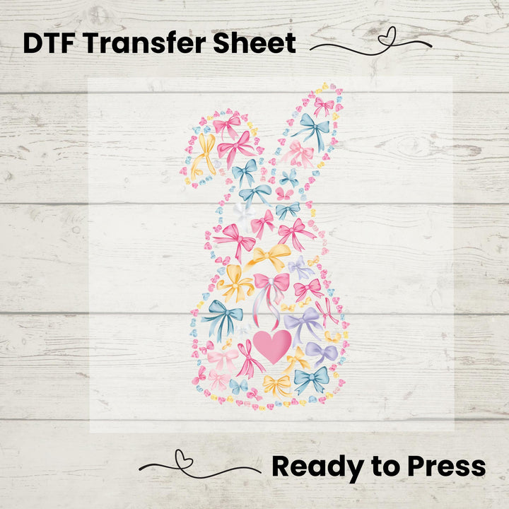 A cute bunny silhouette created with pastel bows, hearts, and floral accents for a soft, springtime look.