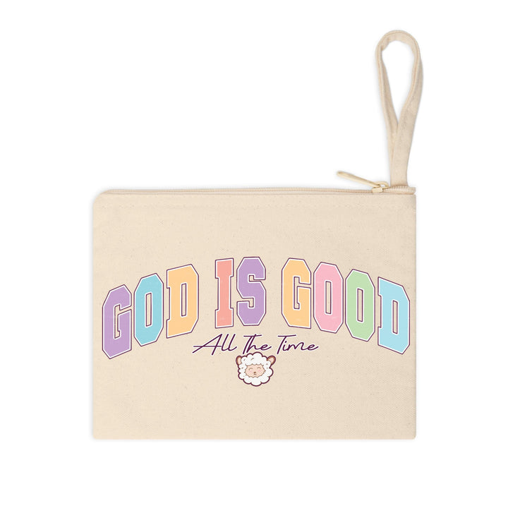A spiritual-themed DTF transfer with "God Is Good" text, soft pastel colors, and a cute lamb illustration.