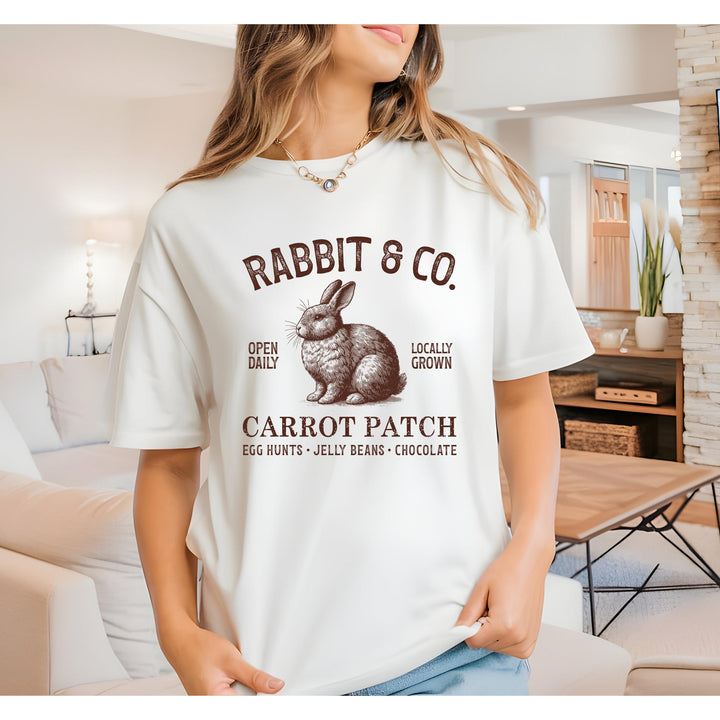 Rustic-themed Rabbit & Co. heat transfer with carrot patch farm design, ready to press on apparel and gifts.

