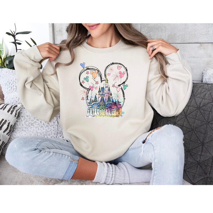 Soft hoodie showcasing a pressed DTF design of a pastel castle framed by Mickey ears and floating balloons.