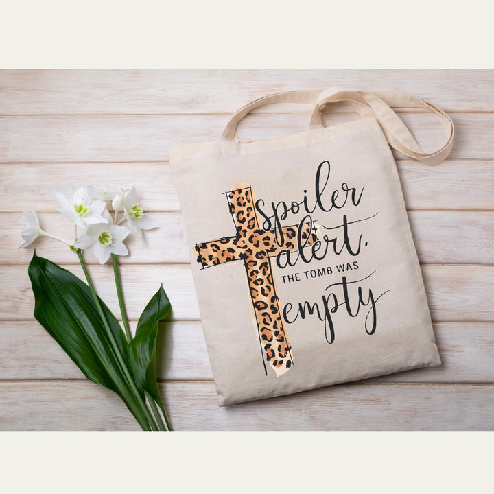A trendy leopard cross paired with an elegant faith message for Christian-inspired apparel and crafts.