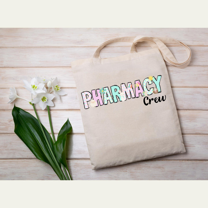 Easter-themed pharmacy heat transfer with colorful pastel tones, perfect for DIY scrubs and t-shirts.