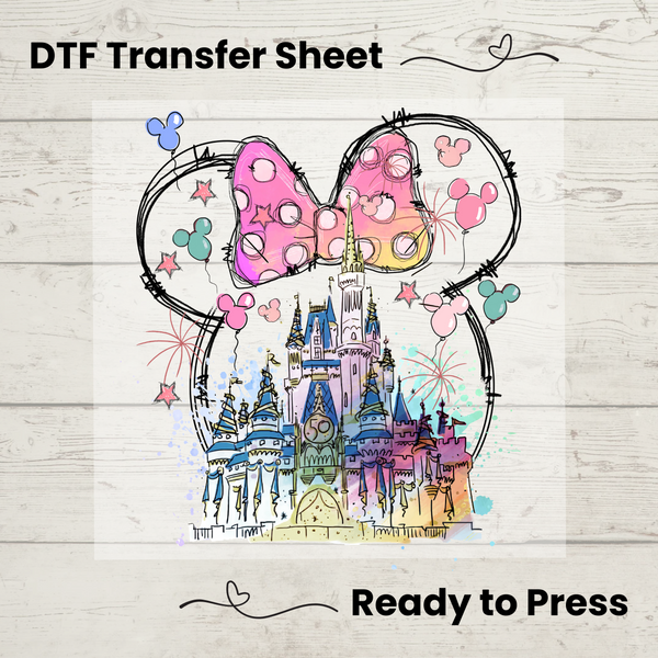 DTF transfer sheet featuring a pastel castle with Minnie ears outline and pink bow, perfect for heat pressing on t-shirts and more.