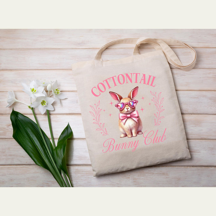Coquette-inspired pastel bunny Easter heat transfer with floral accents and soft pink hues for trendy spring fashion