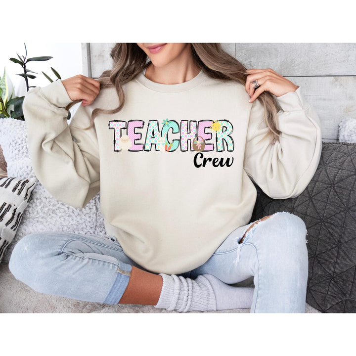Pastel-themed teacher squad Easter heat transfer for matching educator shirts, ready to press.