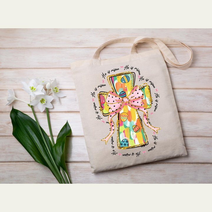 Christian Easter heat transfer featuring a vibrant cross, pink bow, and pastel Easter egg design for faith-based apparel.