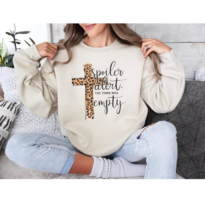A modern Easter DTF transfer featuring a bold faith message with a leopard cross.