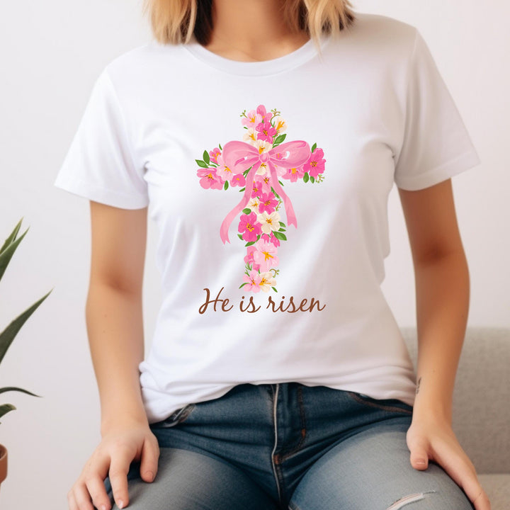 Elegant Christian Easter print featuring a floral cross and pink bow, perfect for spring fashion.

