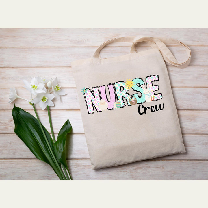 Spring-themed nurse crew heat transfer with Easter elements, ready to press for medical team matching shirts.