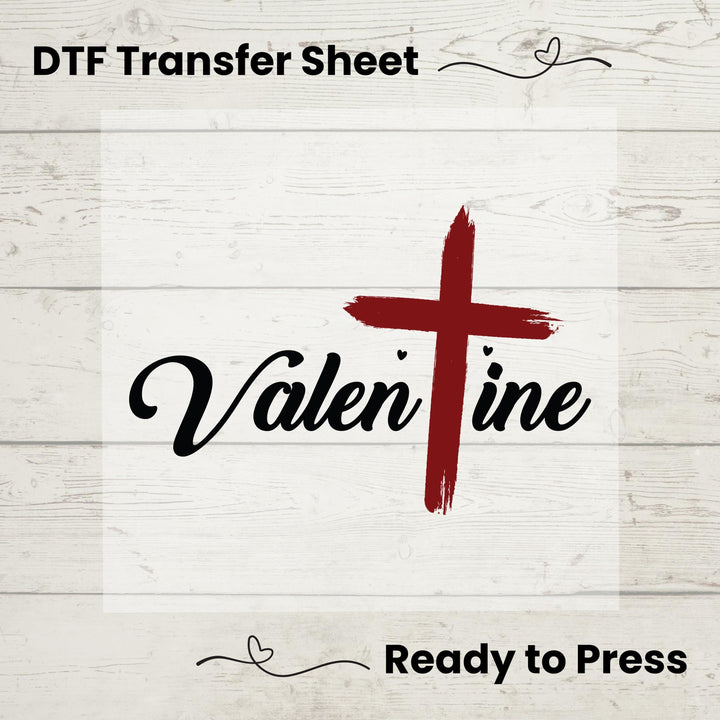A digital image of a DTF transfer sheet with the text 'Valentine' and a cross design, indicating it's ready to be pressed onto a garment.