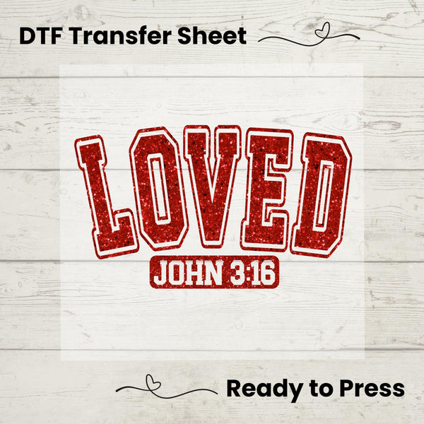 A graphic design of the phrase 'LOVED' with the Bible verse 'John 3:16' printed in red on a white background, indicating it is a DTF (Direct to Film) transfer sheet ready for pressing onto fabric.