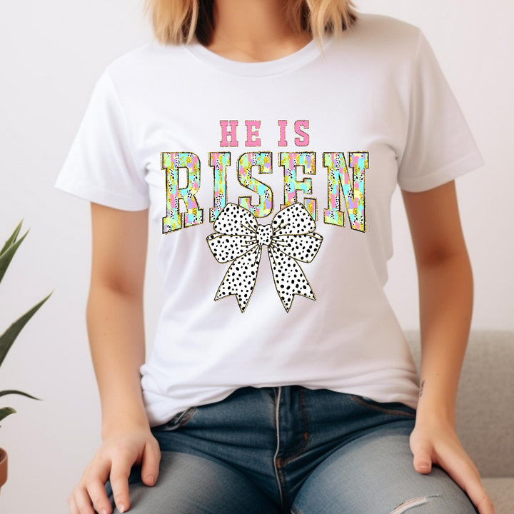 Colorful and playful Easter print emphasizing Jesus' resurrection, perfect for Christian-themed outfits.