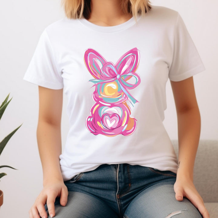 Whimsical pink bunny DTF transfer with pastel swirls – perfect for Easter and spring-themed fashion.
