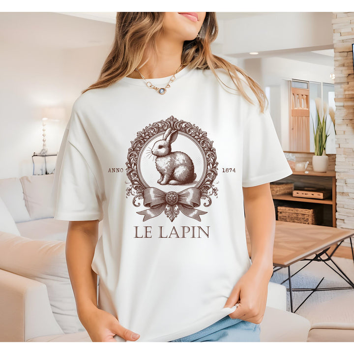  Elegant antique-style DTF transfer featuring a detailed rabbit, ornate frame, and bow with "Le Lapin" text.