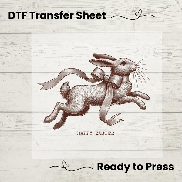 DTF Transfer featuring a vintage hand-drawn rabbit with a flowing ribbon and "Happy Easter" text.