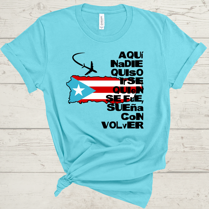 Turquoise t-shirt with Puerto Rican flag and text on a wooden surface