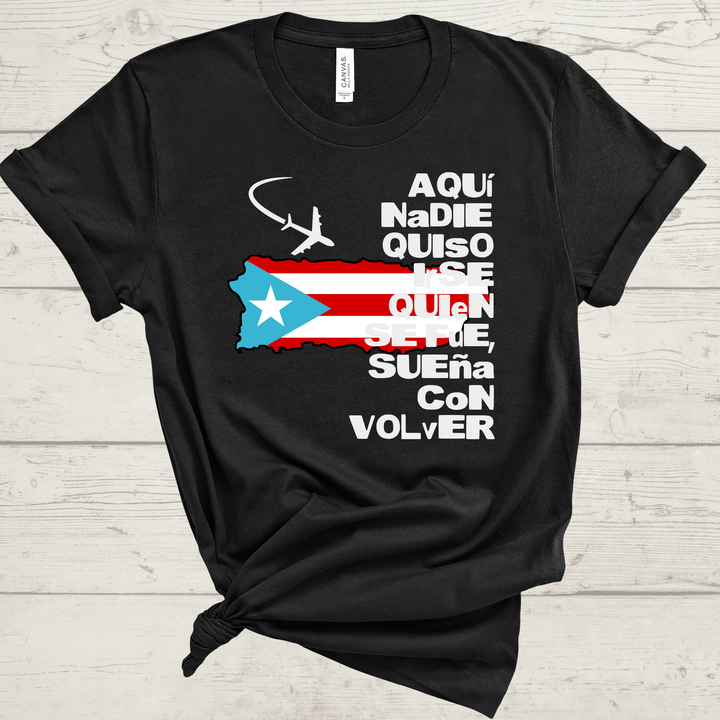 Black t-shirt with Puerto Rican flag and text on a wooden surface