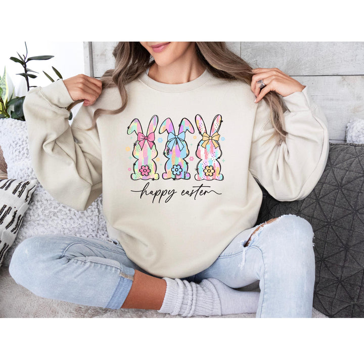 Vibrant, pastel-painted bunnies with bows and flowers in a brushstroke style, ready for pressing on apparel.