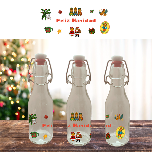 Three clear glass bottles with festive stickers and 'Feliz Navidad' text on a wooden surface with a Christmas tree in the background.