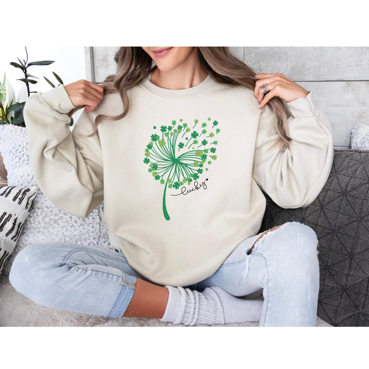 St. Patrick’s Day DTF transfer sheet featuring an elegant whimsical dandelion composed of green shamrocks with 'Lucky' text, ideal for DIY apparel.