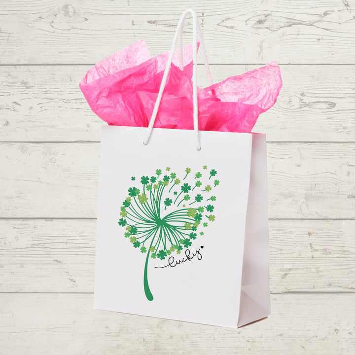 St. Patrick’s Day DTF transfer sheet featuring an elegant whimsical dandelion composed of green shamrocks with 'Lucky' text, ideal for DIY apparel.