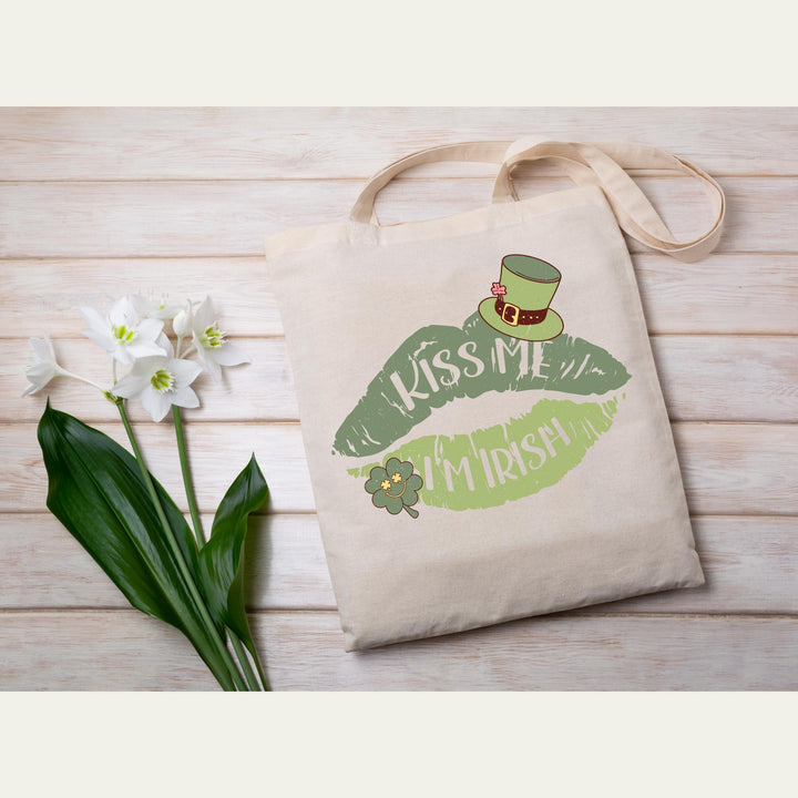 Kiss Me I'm Irish DTF Transfer featuring green lips, shamrock, and leprechaun hat for St. Patrick's Day apparel DIY projects.