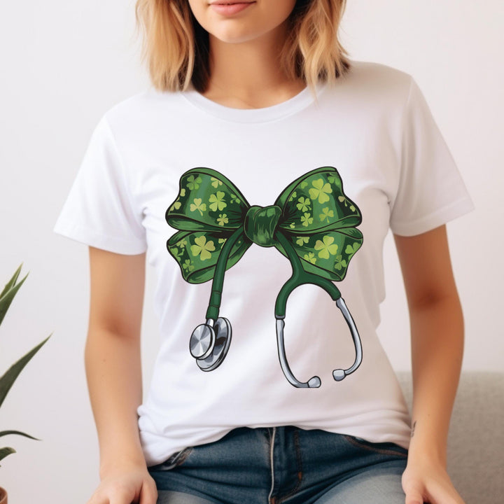 St. Patrick’s Day Nurse DTF transfer featuring a green coquette bow with shamrocks on a stethoscope, ideal for DIY nurse and medical apparel.