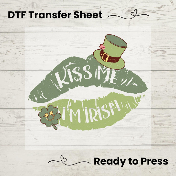 Kiss Me I'm Irish DTF Transfer featuring green lips, shamrock, and leprechaun hat for St. Patrick's Day apparel DIY projects