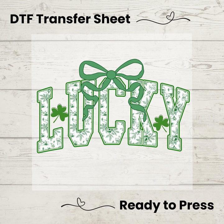 Lucky Vibes DTF Transfer – Chinoiserie Coquette St. Patrick’s Day heat press design with a retro green bow, ready to press for shirts and hoodies.