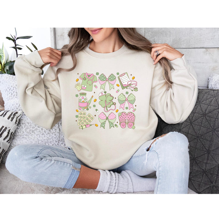 St. Patrick’s Day Nurse DTF transfer featuring coquette aesthetic, pastel pink and green nurse graphics including stethoscopes, scrubs, bows, and crocs.
