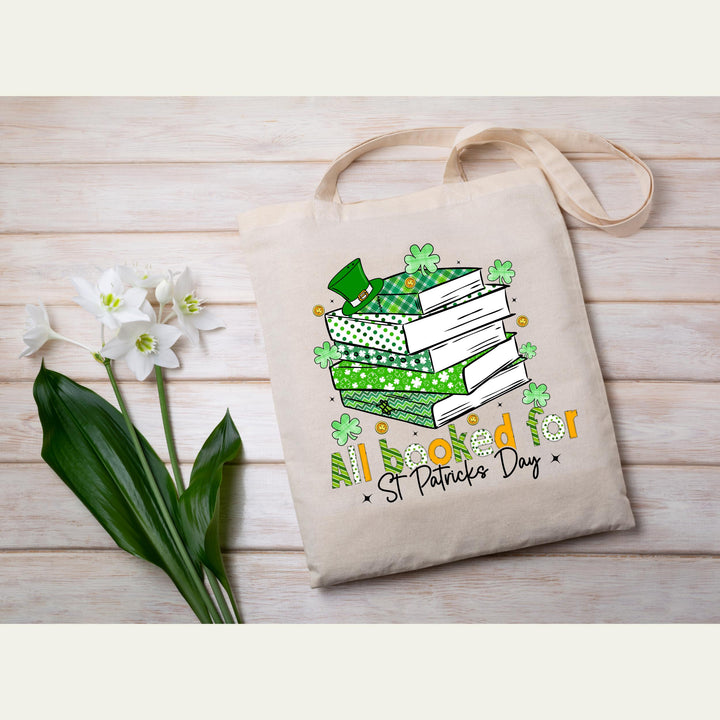 All Booked for St. Patrick’s Day DTF transfer featuring a festive green book stack, shamrocks, and leprechaun hat—perfect for DIY book-lover apparel.