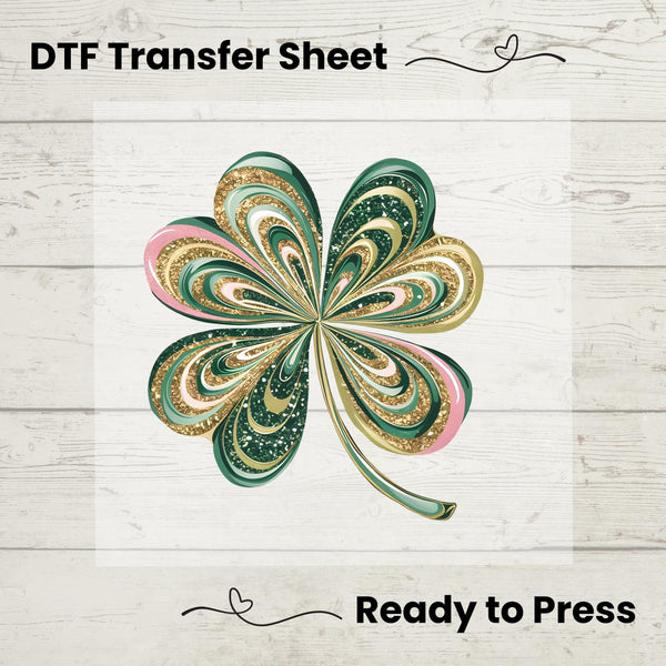 St. Patrick’s Day Glitter Shamrock DTF transfer featuring sparkling green, pink, and gold glitter swirls perfect for festive DIY apparel.