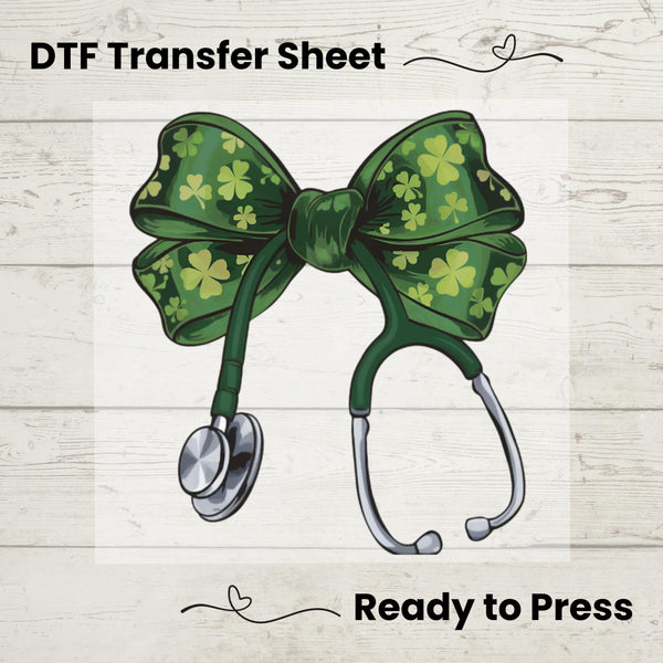St. Patrick’s Day Nurse DTF transfer featuring a green coquette bow with shamrocks on a stethoscope, ideal for DIY nurse and medical apparel.