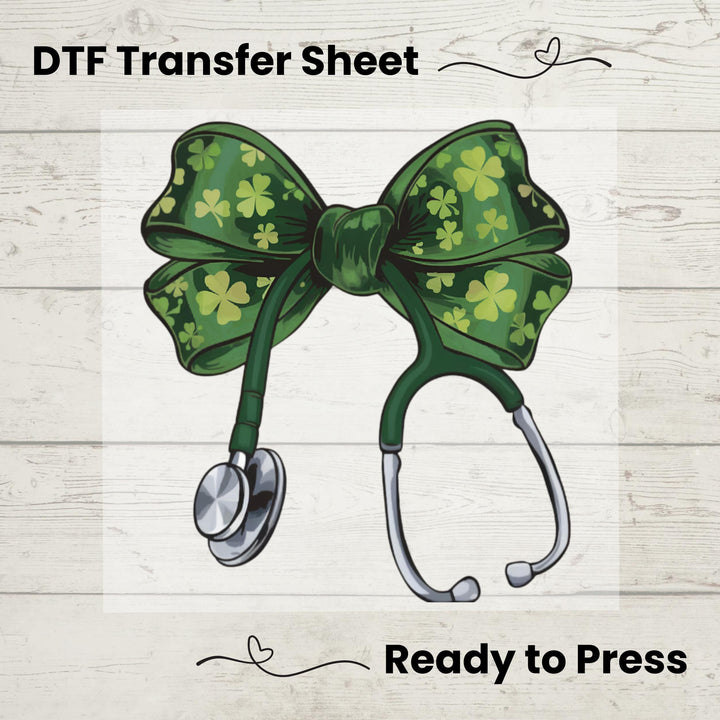 St. Patrick’s Day Nurse DTF transfer featuring a green coquette bow with shamrocks on a stethoscope, ideal for DIY nurse and medical apparel.